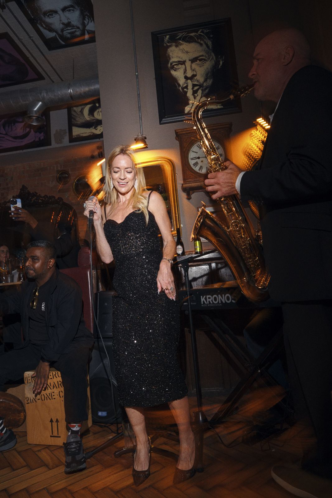 A singer performing in the bar